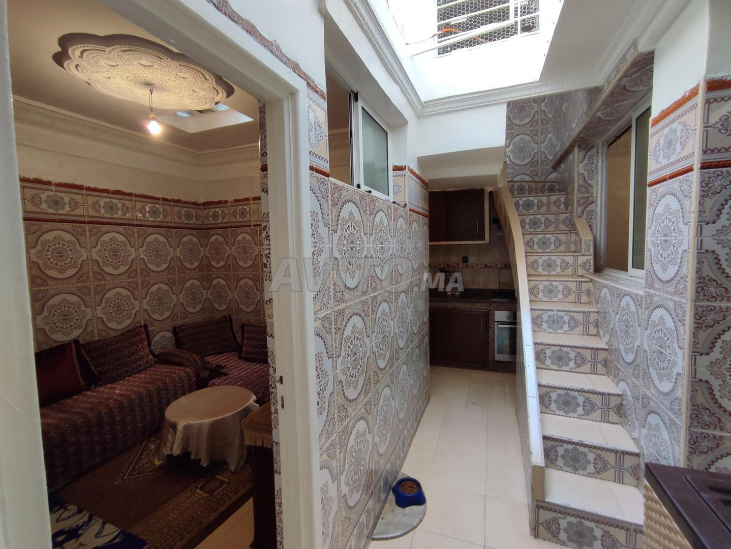 Appartement RDC avec Magasin à vendre à H M Casablanca
