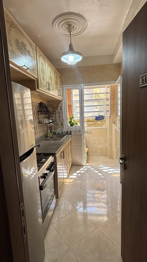 Appartement équipé, au rez-de-chaussée À louer