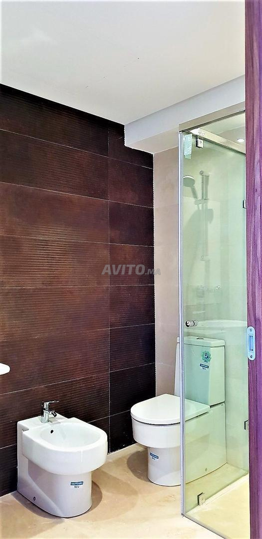 مكتب للايجار ٨١م٢ في الدار البيضاء — Photo 15
