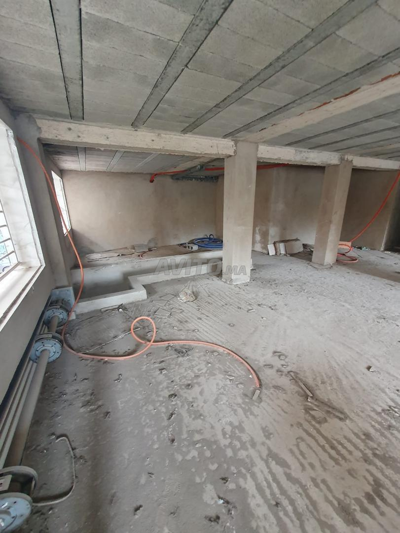 محل تجاري 114 م² للايجار في طنجة — Photo 14