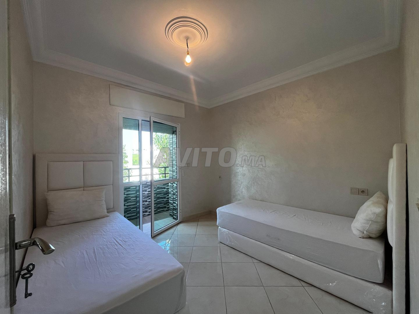شقة مفروشة 93م² للإيجار في طنجة — Photo 11