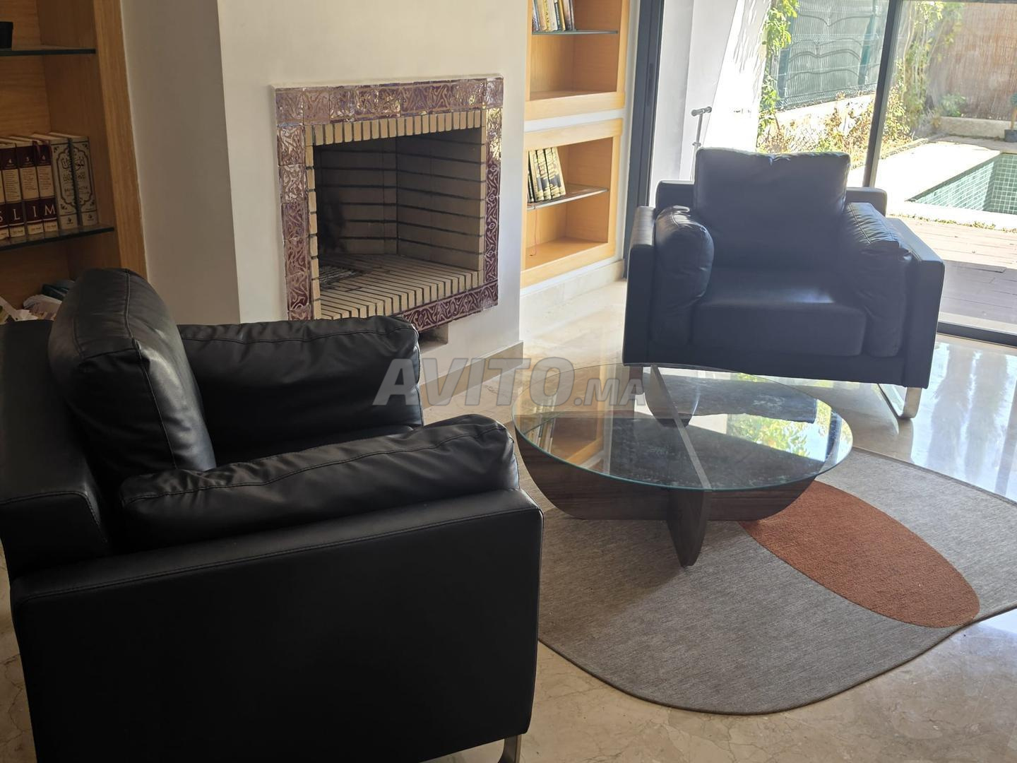 Selling 2 leather-style armchairs