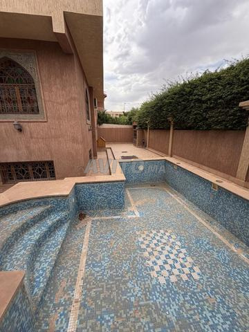 Three-sided villa for sale with pool